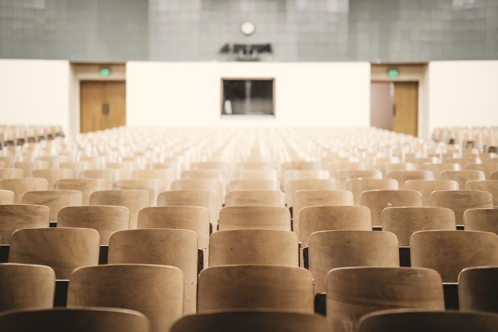 Auditorium seating facing a presentation stage